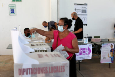 Votaciones mujer