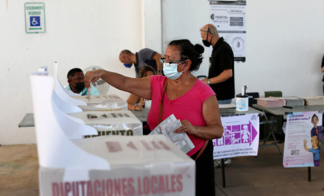 Votaciones mujer