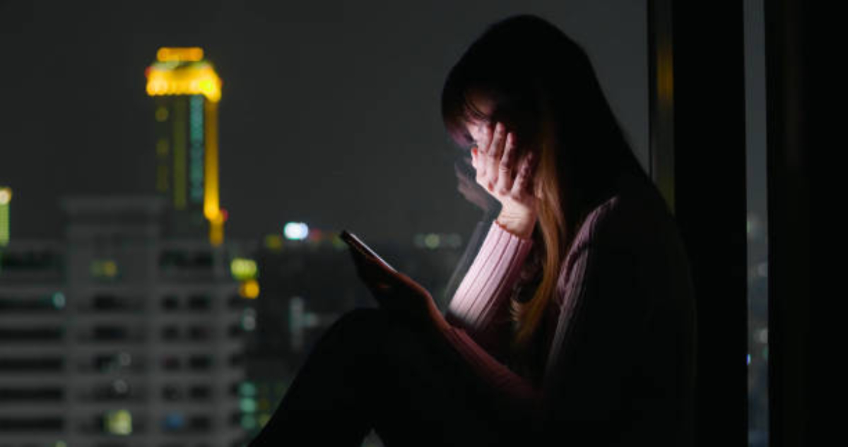 Woman Use Phone And Feel Depression At Nigh