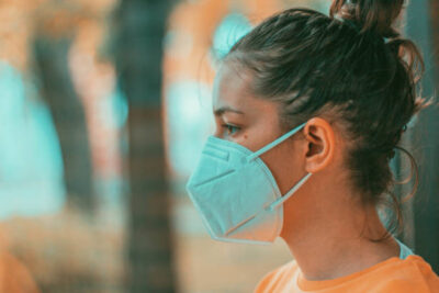 Protection mask for covid19 virus on the young girl face