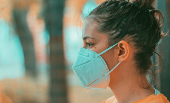 Protection mask for covid19 virus on the young girl face