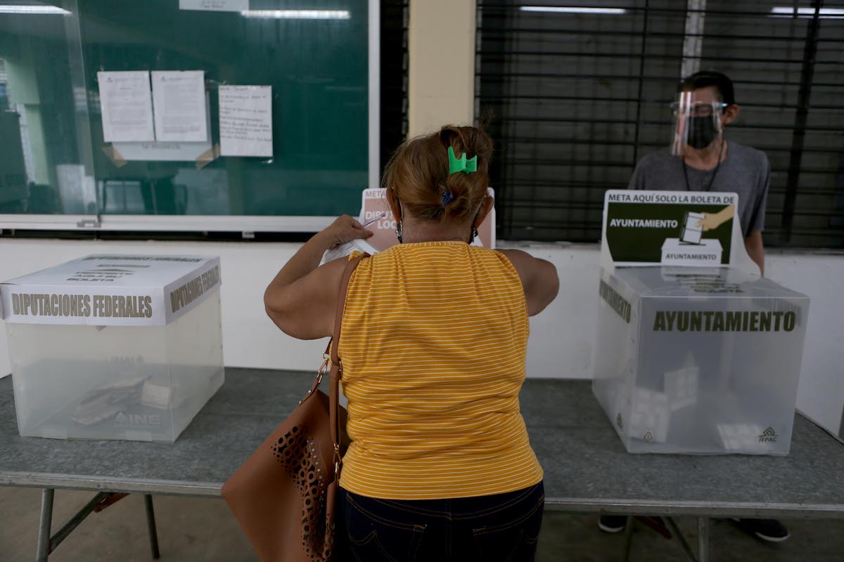 Mujeres Votaciones